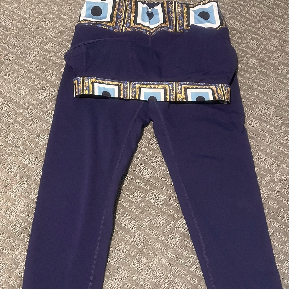Navy evil eye gym set by Luxeit. Top was $60. Bottoms were $100